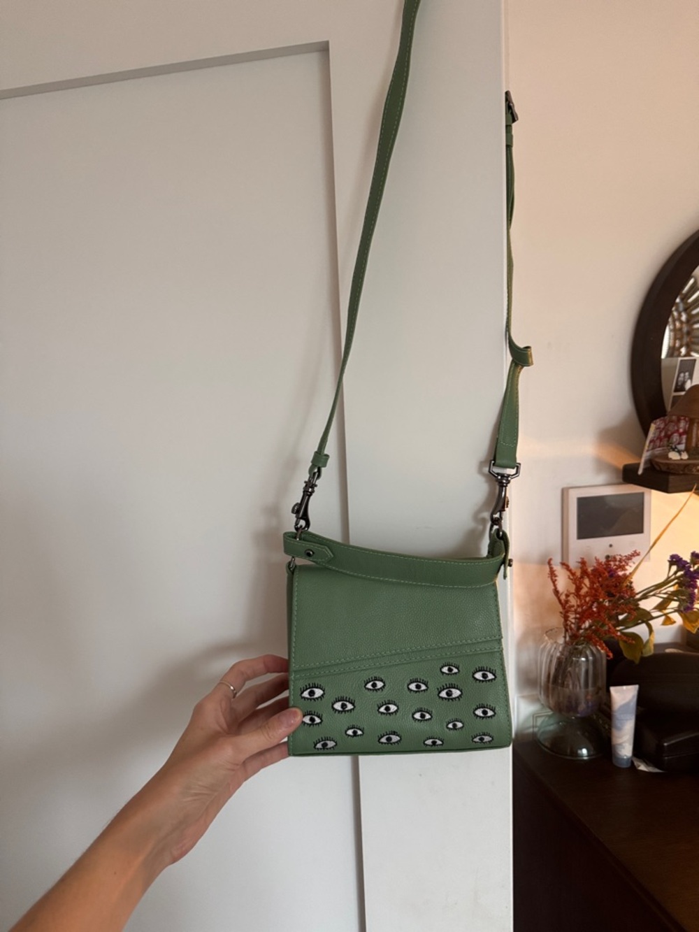 Green Eye-Embellished Crossbody Bag